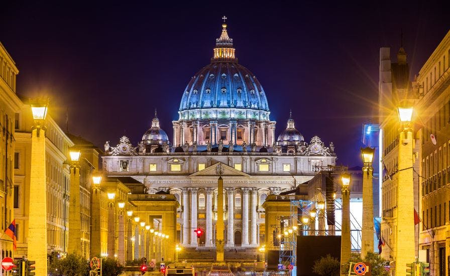 st.peters basilica dome in rome at night illuminated showcasing its grandeur